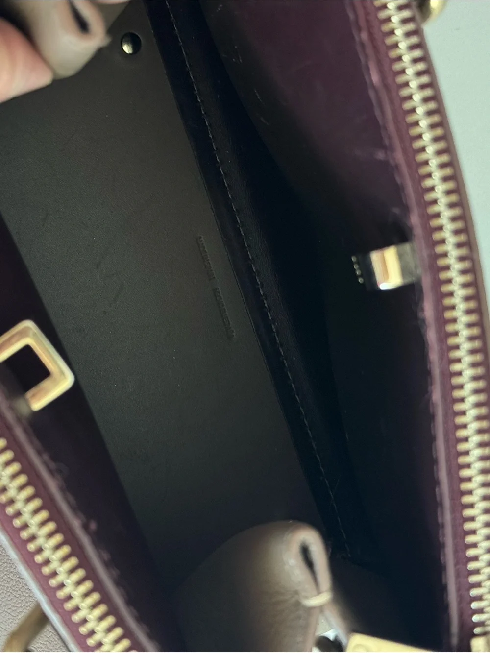 Carolina Herrera Elegant Brown Leather Top-Handle Handbag with Tassel Charm